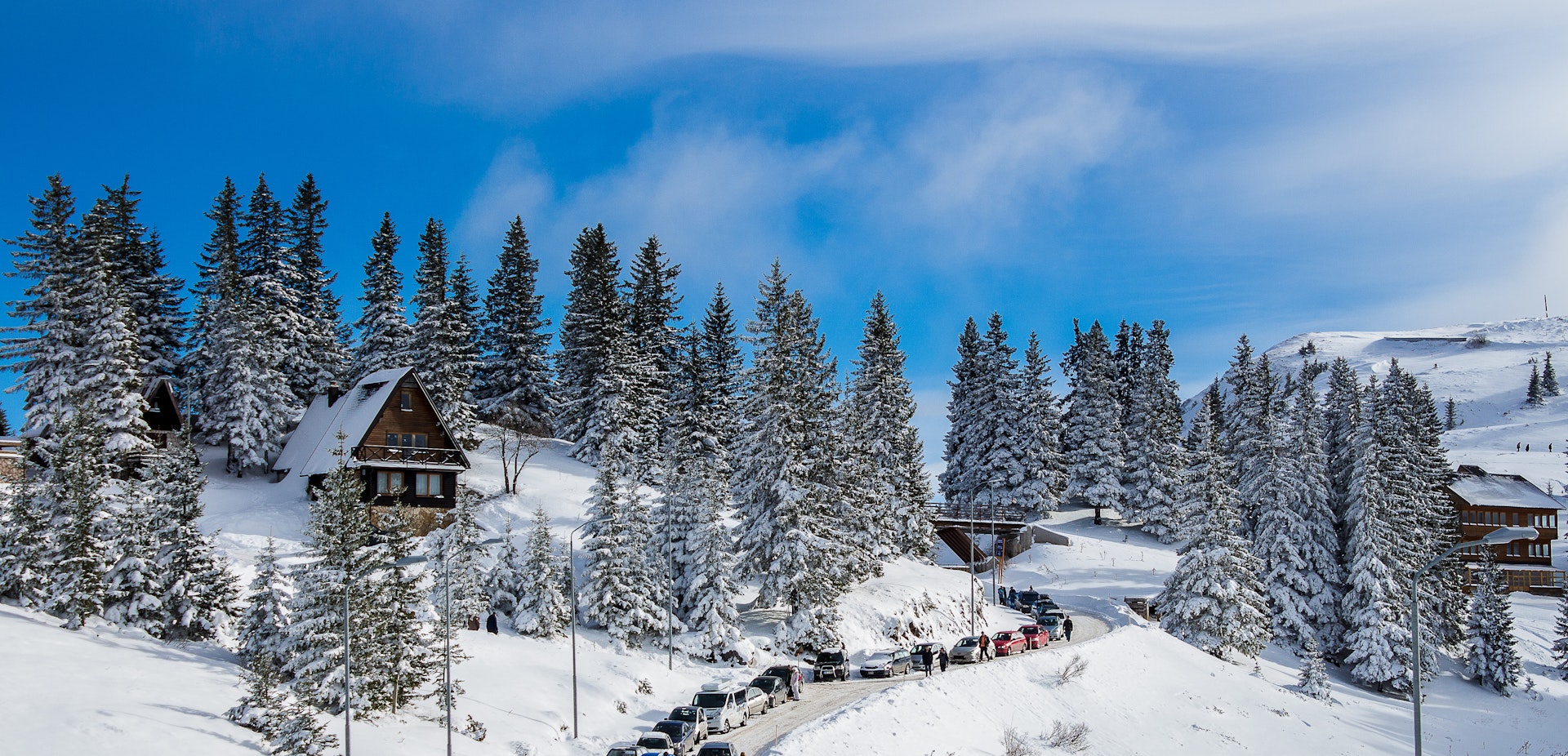  A mountainous, snowy scene shows a ski lift near Sarajevo. 