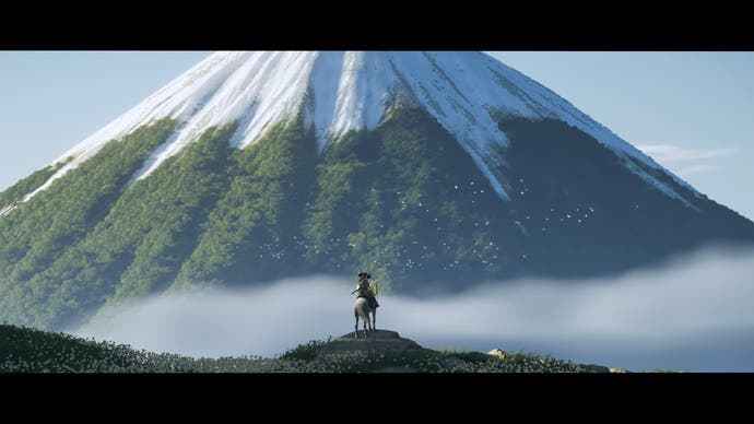 Ghost of Yotei trailer screenshot showing imposing mountain with small figure in front