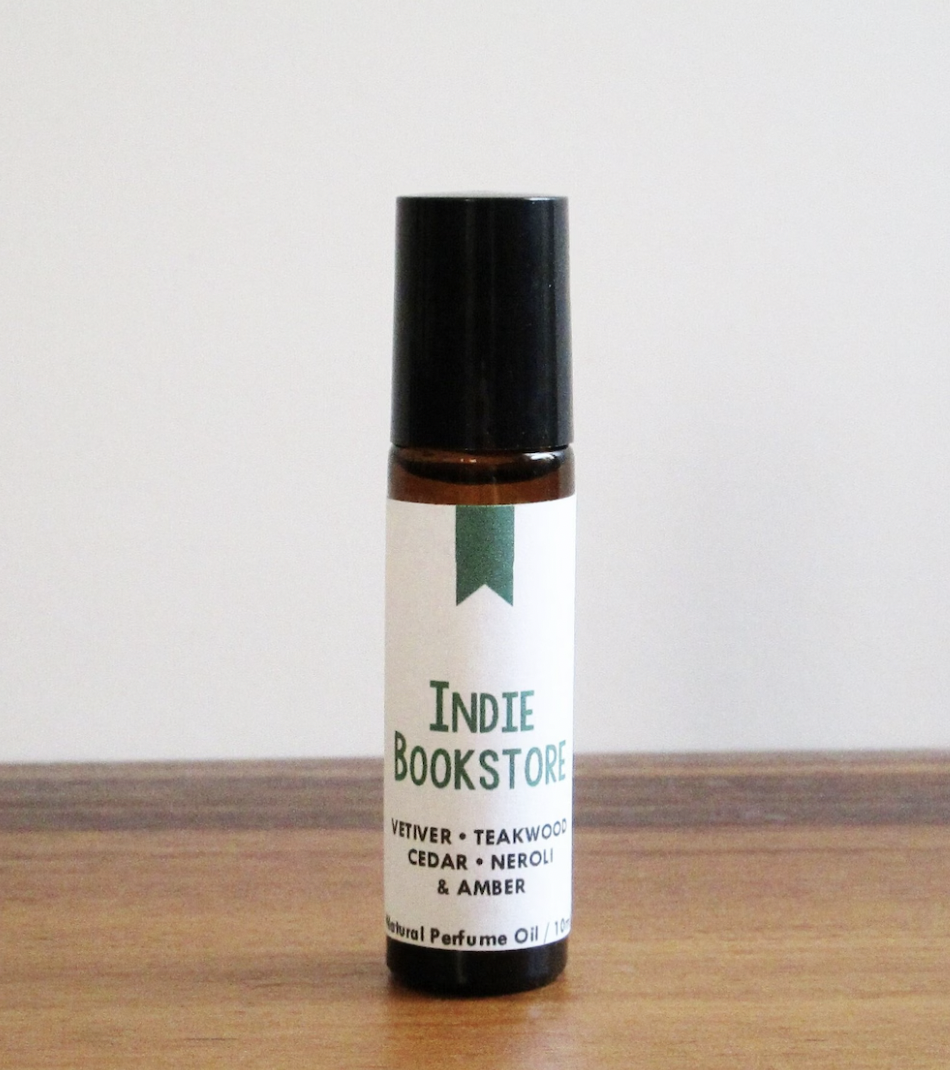 Image of a small bottle of roll-on perfume oil scented like an indie bookstore