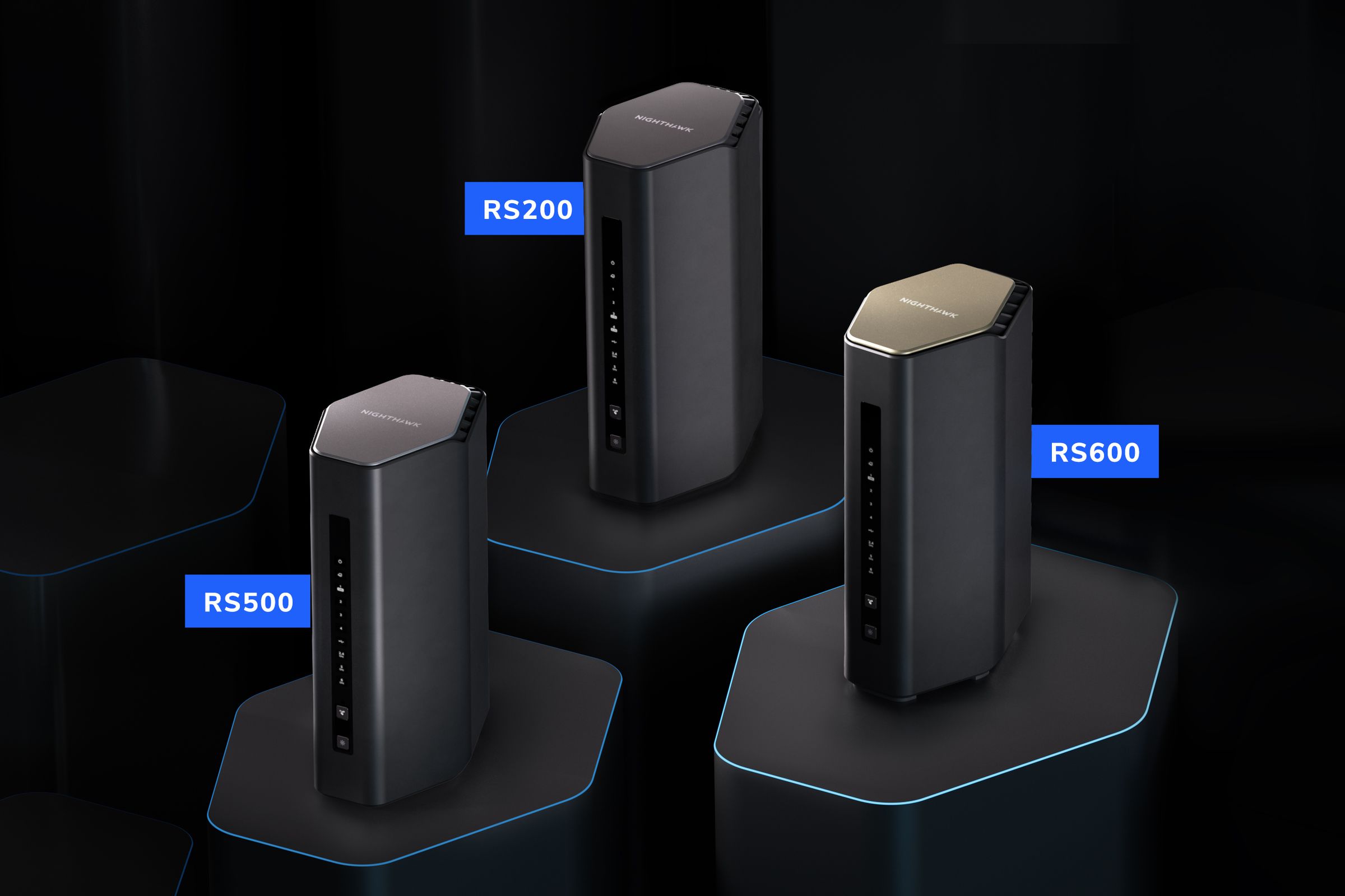 Netgear’s new Nighthawk routers, all three tower-style and similar in appearance, grouped together in a triangle configuration.