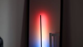 Govee Floor Lamp 2 projecting multicolored light onto wall