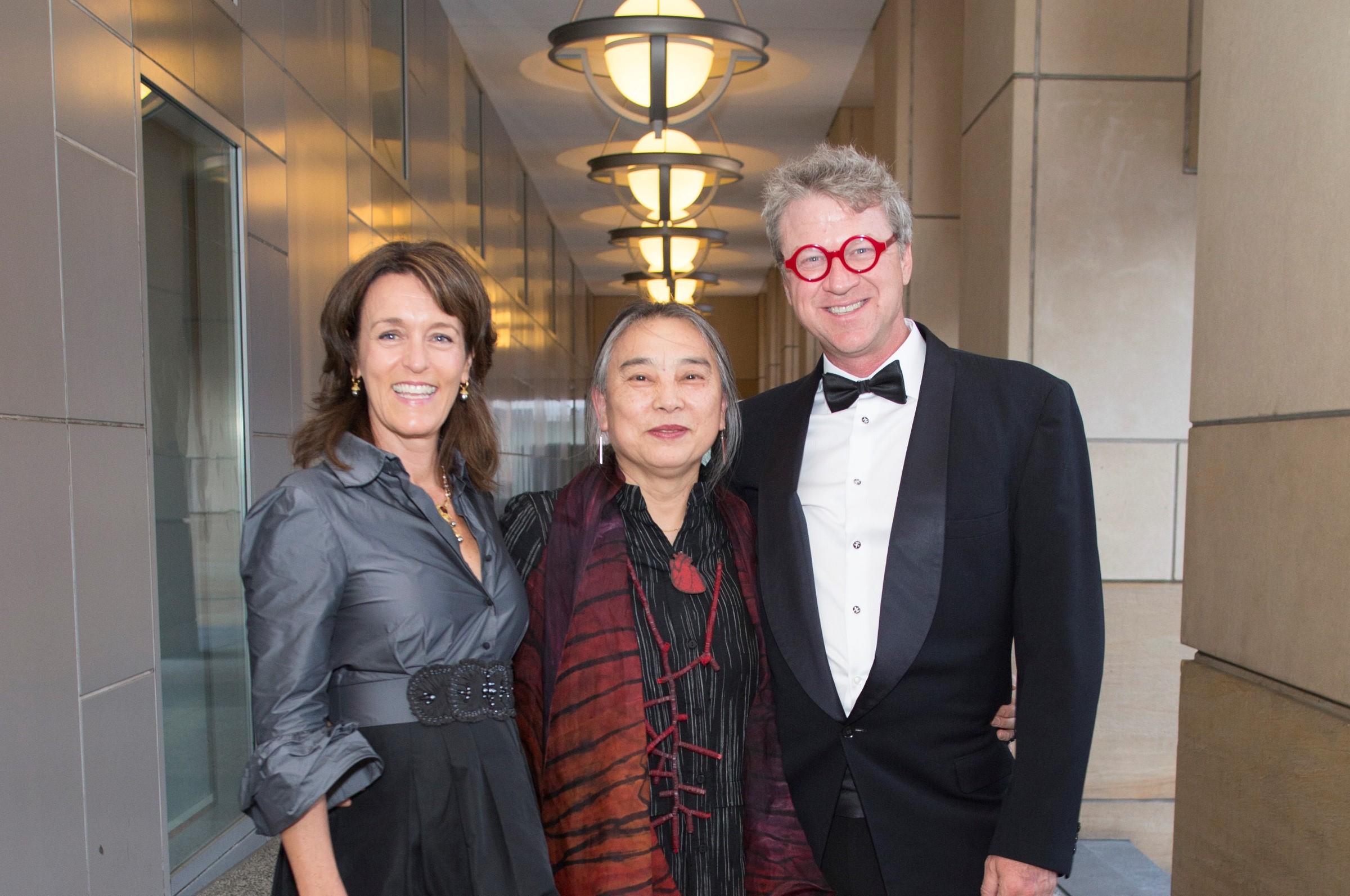 Tonya Turner Carroll (left), artist Hung Liu, and Michael Carroll in an archival photograph