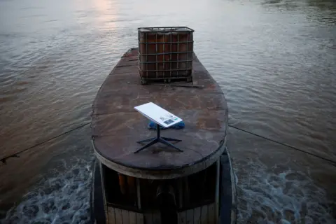 Reuters A Starlink satellite internet system set up on a miners' boat on the Madeira River in Porto Velho, Rondonia state, Brazil