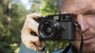 Leica MP camera in the hand