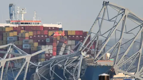 Getty Images M/V Dali under the remains of the Key Bridge in Baltimore