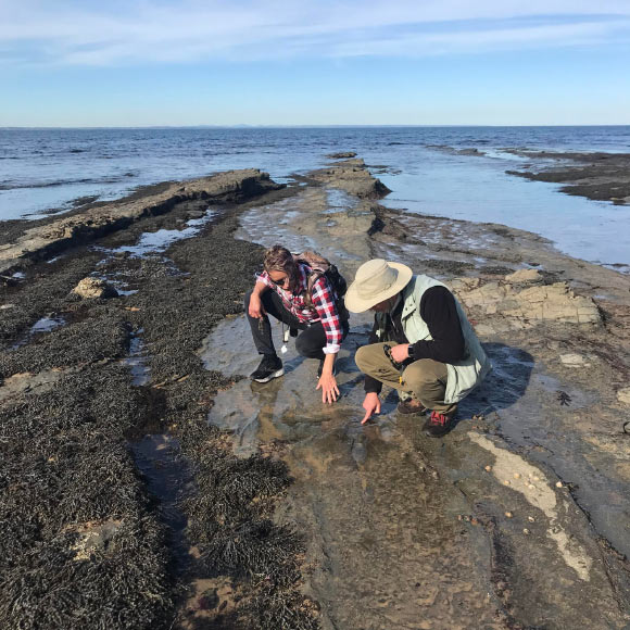 Melissa Lowery and Anthony Martin examine a dinosaur track. Image credit: Ruth Schowalter.