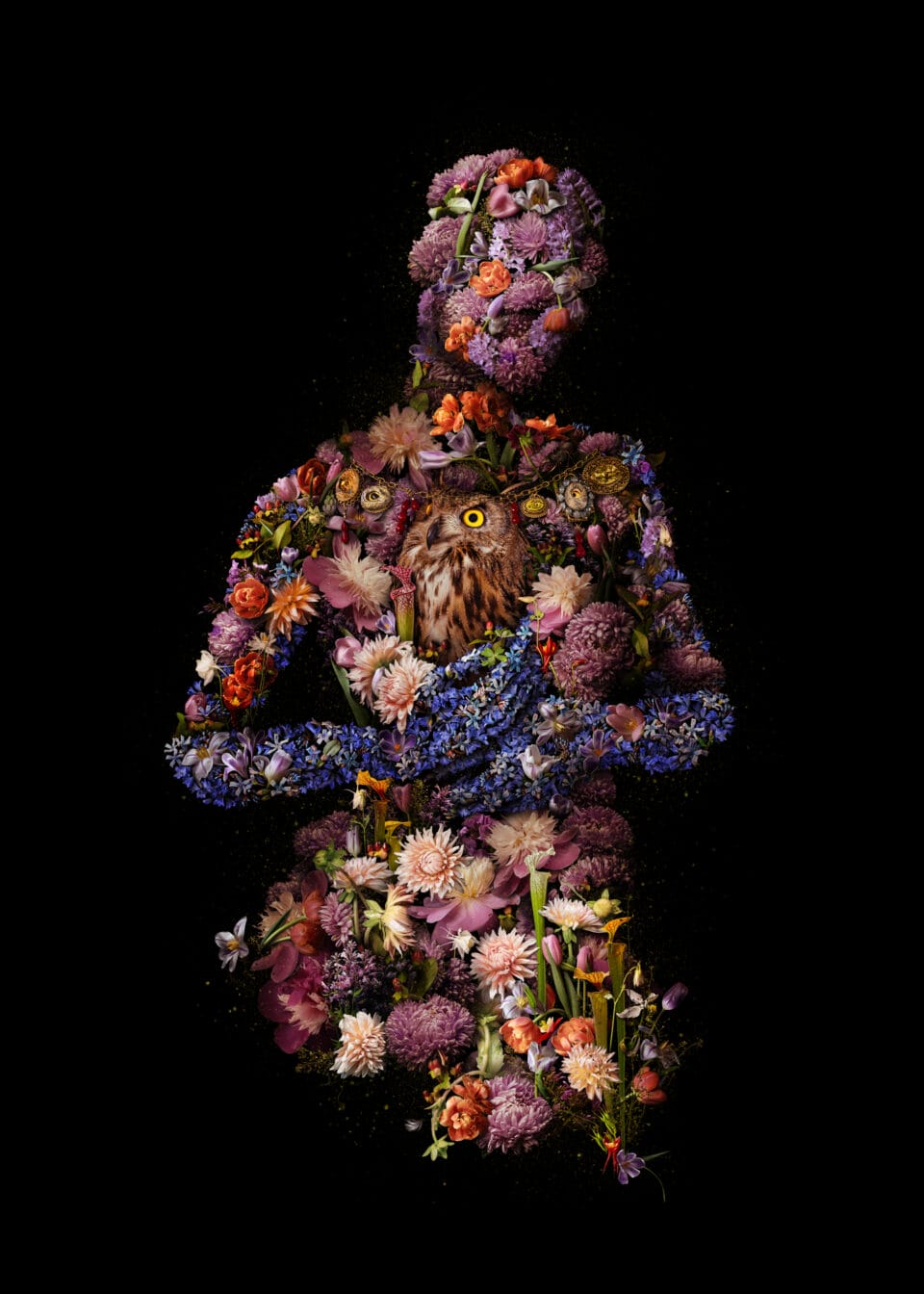 vibrant botanicals are collaged into a woman's figure