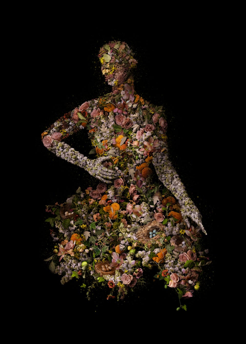 vibrant botanicals are collaged into a woman's figure