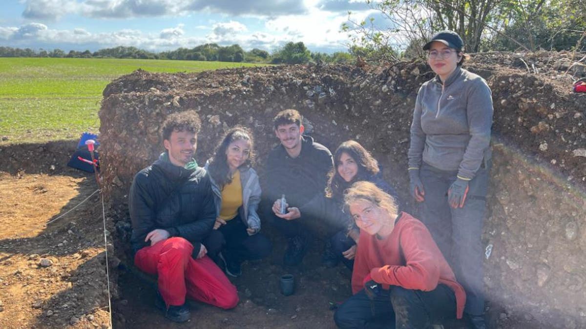 Volunteer team at site where the message was found