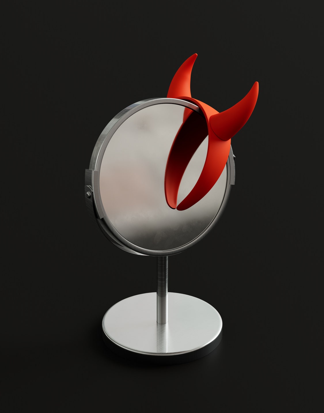 A small standing mirror with a headband featuring devil ears draped over it.