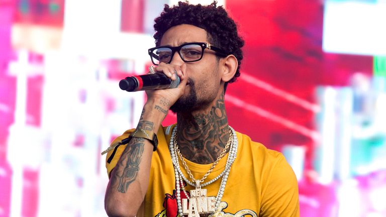 FILE - Philadelphia rapper PnB Rock performs at the 2018 Firefly Music Festival in Dover, Del., June 16, 2018. (Photo by Owen Sweeney/Invision/AP, File)