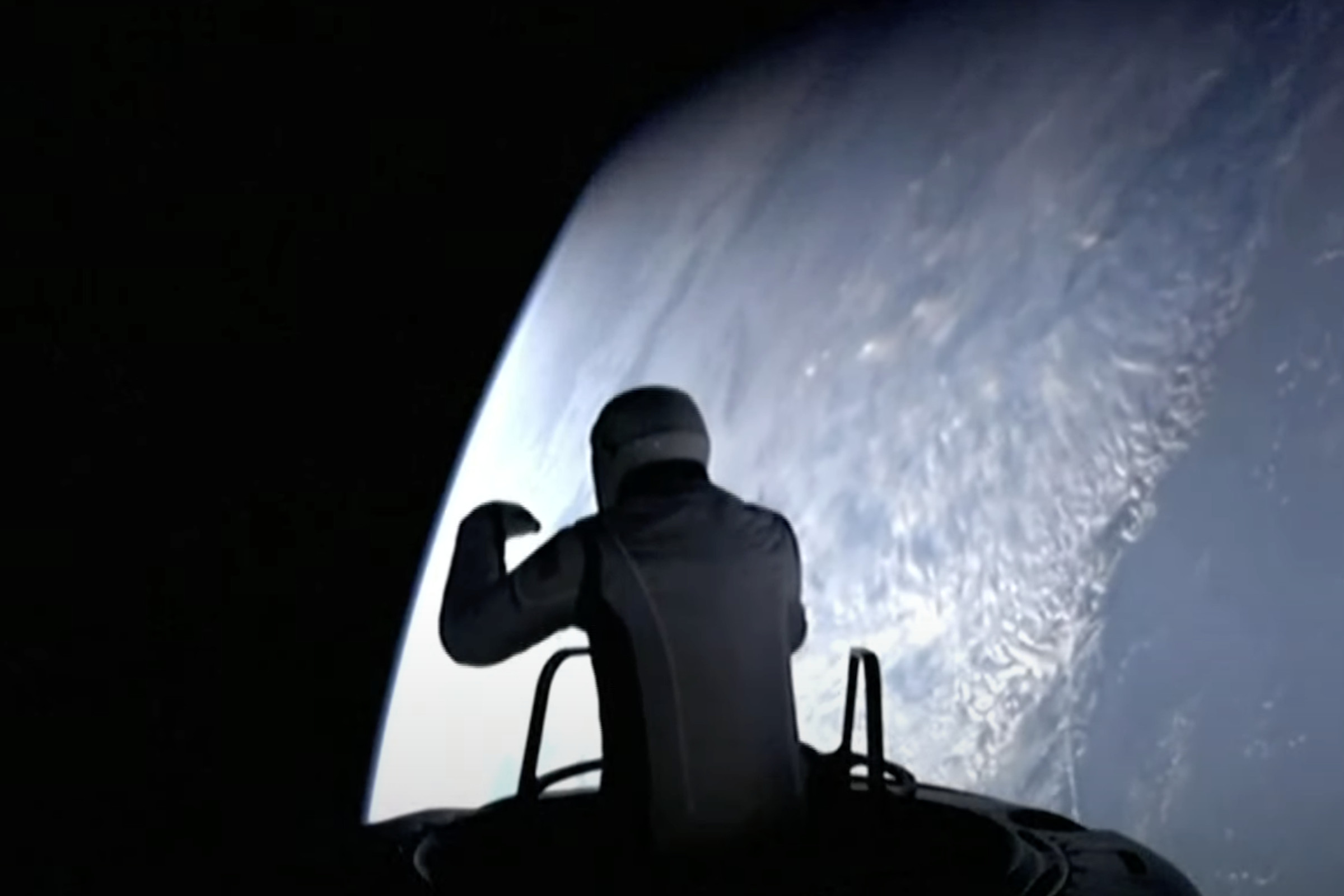 Privatey-trained astronaut Jared Isaacman emerges from the capsule.