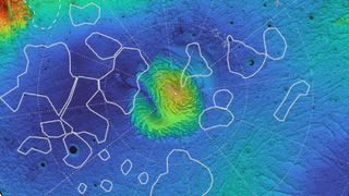 A blue map of Mars with white outlines showing the locations of underground blobs