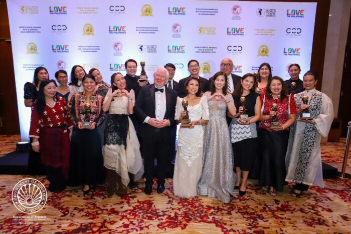 Department of Tourism (DOT) Secretary Christina Garcia Frasco (fifth from right), along with officials of the DOT and Tourism Promotions Board (TPB) Philippines, poses with World Travel Awards (WTA) Founder Graham Cooke (fourth from left) on the sidelines of the Philippines' successful hosting of the 31st WTA Asia & Oceania Gala Ceremony 2024 spearheaded by the DOT and TPB Philippines.