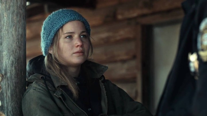 Jennifer Lawrence in Winter's Bone wearing a parka and beanie hat.